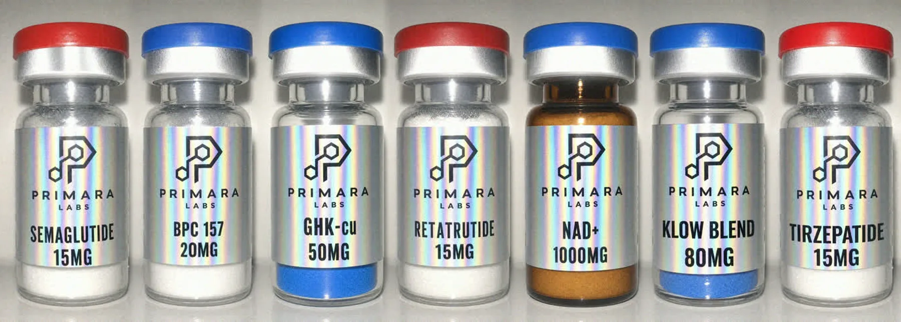 Seven Primara Labs vials photographed side by side: semaglutide, BPC-157, GHK-Cu, retatrutide, NAD+, KLOW blend and tirzepatide